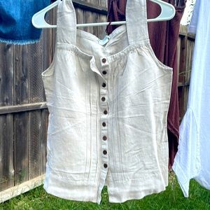 Beautiful woman’s tan linen tank top.